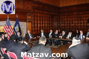 Left to right at head of table: Assembly Speaker Sheldon Silver, Secretary to the Governor Mr. William Cunningham, Agudath Israel executive vice president Rabbi Chaim Dovid Zwiebel.