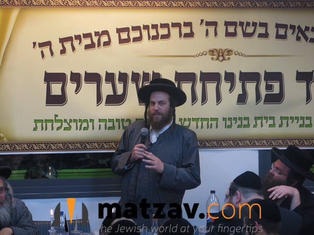 Rabbi Yaakov Eliezer Shisha warmly addressing the orphans.