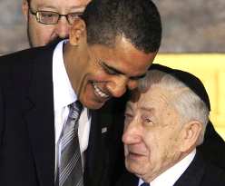 President Barack Obama hugging a Holocaust survivor at the Holocaust remembrance ceremony. 