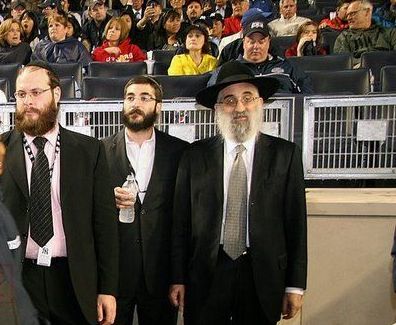 Rabbi Don Yoel Levy (R) of the OK.