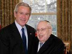 Dr. Lander with former President George W. Bush.
