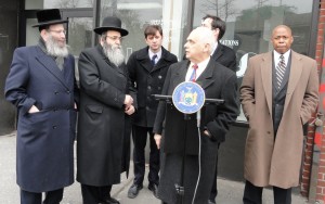 assemblyman-lentol-announcing-the-introduction-of-the-bill-at-the-ujo-in-march-with-senator-squadron-borough-president-eric-adams-councilman-stephen-levin-and-rabbi-david-niederman