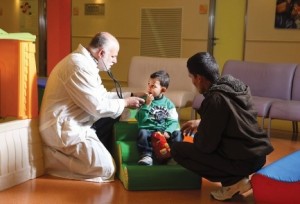dr-david-mishali-with-young-syrian-heart-patient