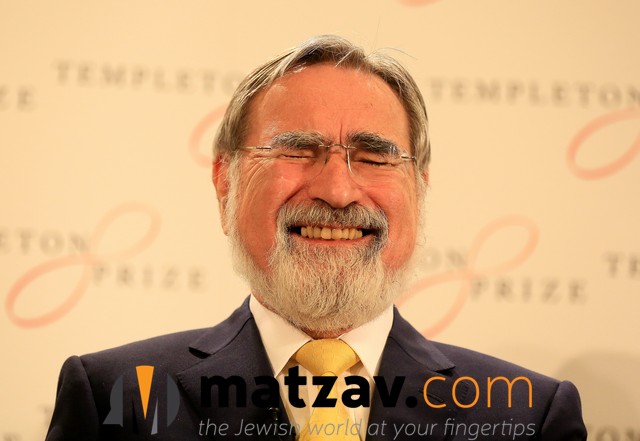 Rabbi Lord Jonathan Sacks, the former Chief Rabbi of the United Hebrew Congregations of the Commonwealth smiles at a news conference as it is announced he has been awarded the 2016 Templeton Prize, London, March 2, 2016. photo by Paul Hackett