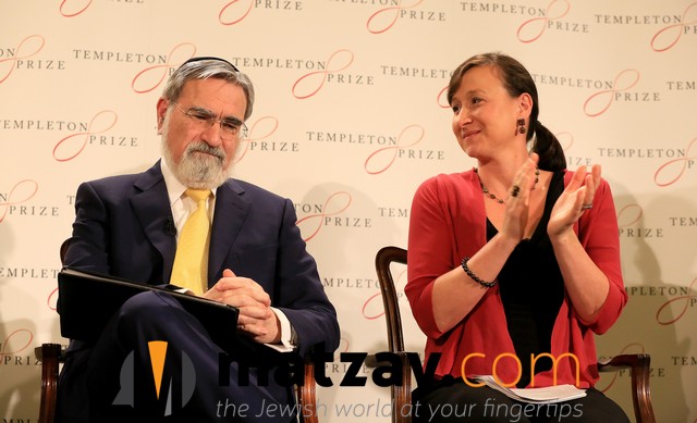 Rabbi Lord Jonathan Sacks, the former Chief Rabbi of the United Hebrew Congregations of the Commonwealth smiles at a news conference sitting next to Jennifer Templeton Simpson, grand daughter of Sir John Templeton and Chair of the John Templeton Foundation Board of Trustees as it is announced he has been awarded the 2016 Templeton Prize, London, March 2, 2016. photo by Paul Hackett