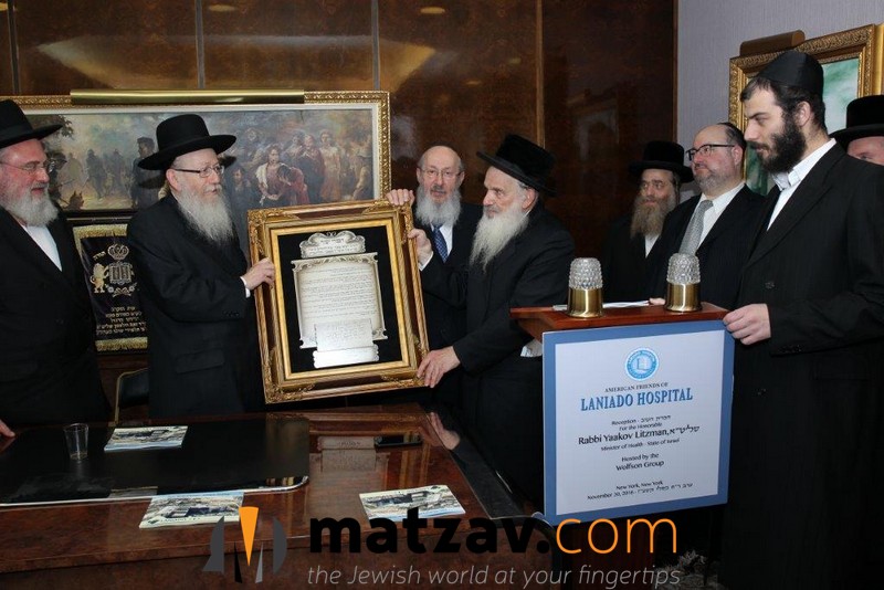 presentation-to-israels-minister-of-health-rabbi-yaakov-litzman-by-leibish-morgenstern-and-aaron-shaye-spitzer-looking-on-are-michael-rosenberg-left-and-rabbi-yitzchok-waldman-2nd-from-right