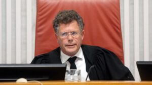 Shas Blasts Supreme Court Chief Over ‘Two Phones’ Remark: ‘Brazen Mockery’ of Chareidi Public