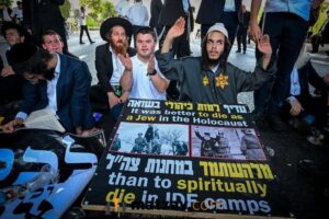 Yellow Stars, Holocaust Images Displayed at Fiery Bnei Brak Draft Protest