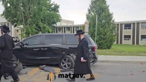 Panic at Tosh Yahrtzeit as Car Plows Into Parked Vehicles, Ending in Miraculous Escape